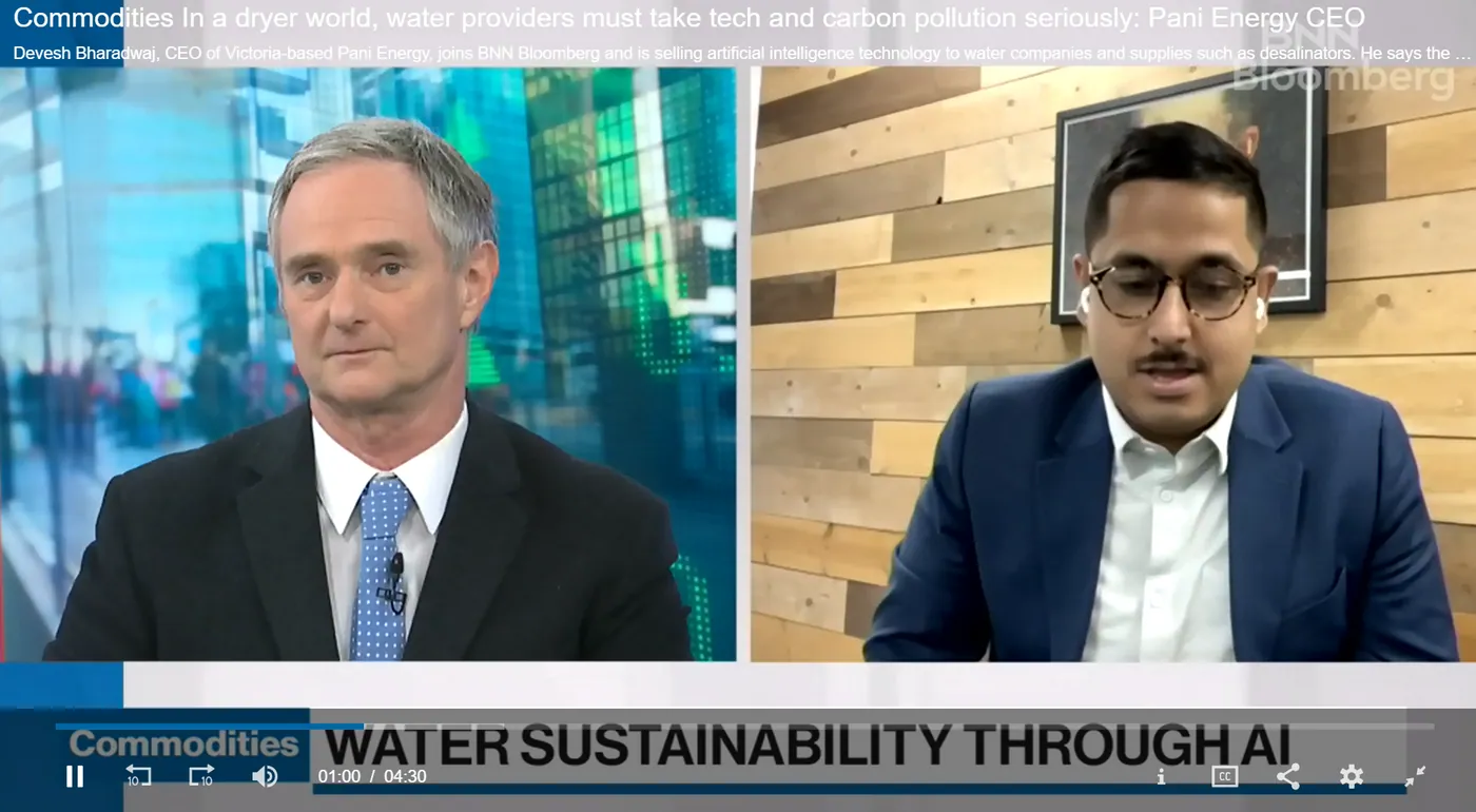 Two men in side by side screens, with a news ticker at the bottom that reads 'Commodities: Water Sustainability Through AI.'
