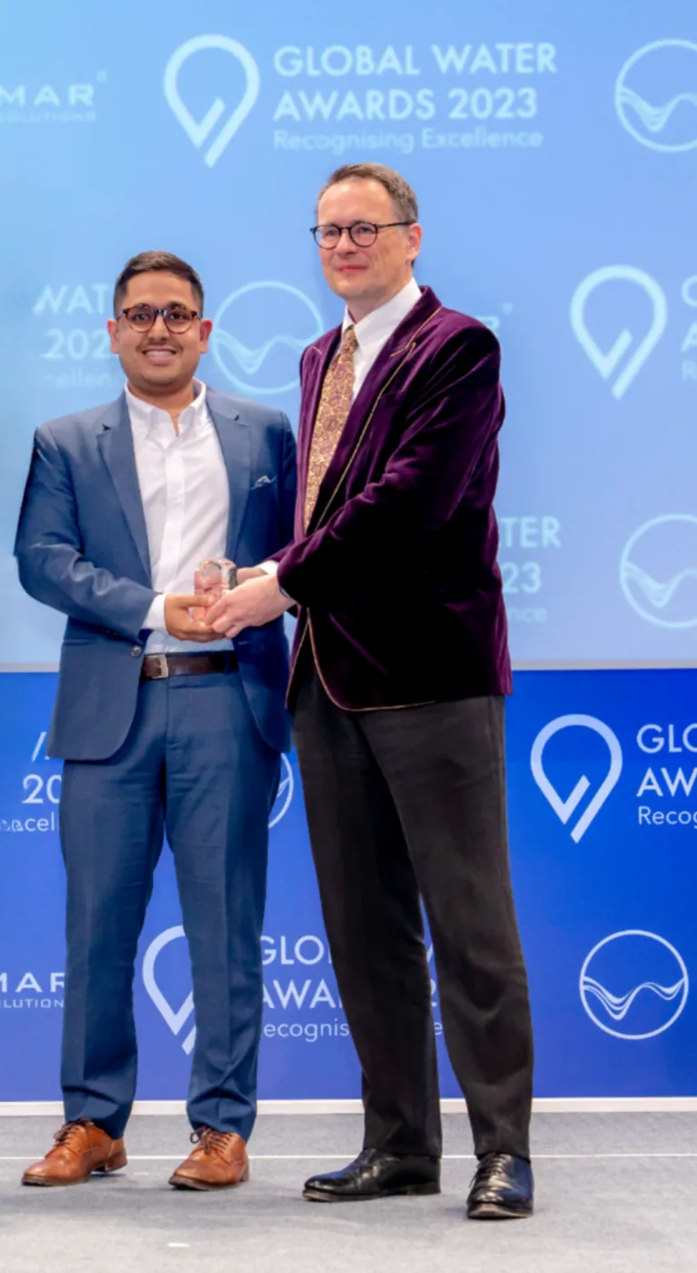Pani CEO accepting award on stage